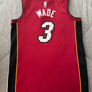 Very good condition adult small Dwayne Wade Miami Heat jersey.